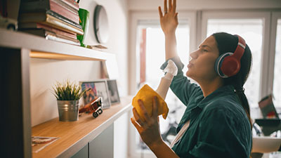 Person listening to music while doing cleaning